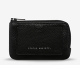 Status Anxiety | Left Behind Wallet